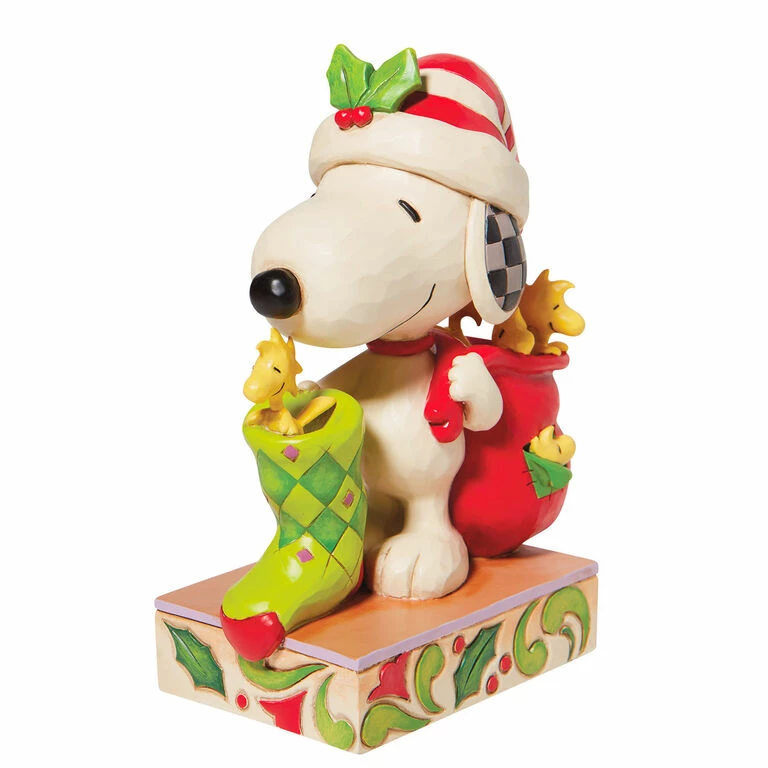 Enesco Jim Shore Peanuts Snoopy And Woodstock With Stocking Figurine, 7" 1 Enesco Jim Shore Peanuts Snoopy And Woodstock With Stocking Figurine, 7"